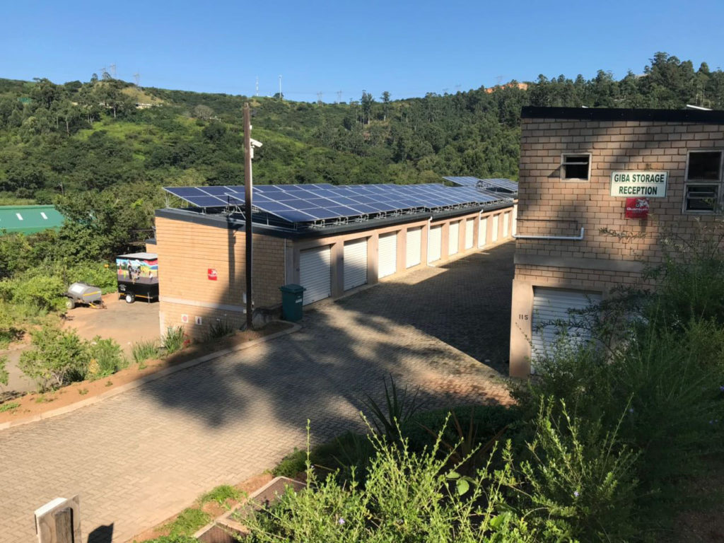 A row of secure storage units at Giba Storage in Westmead with the green KwaZulu-Natal hills behind